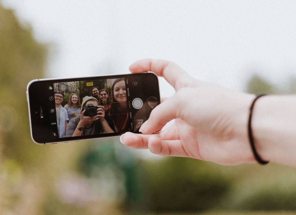 Taking selfie on smartphone