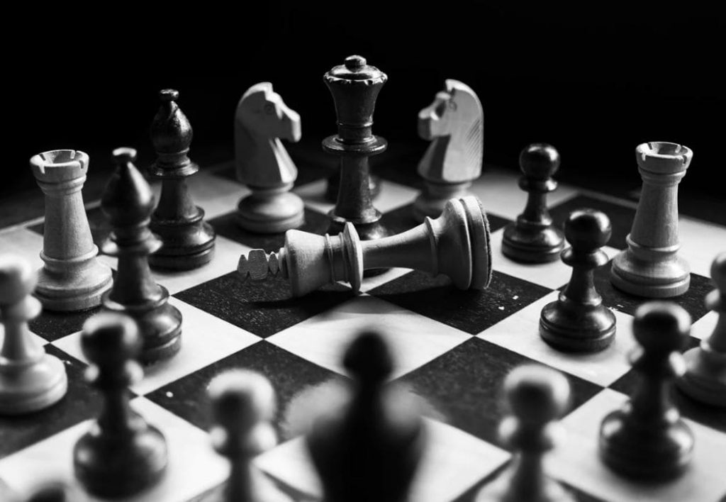 Playing chess Black and white chess board and pieces