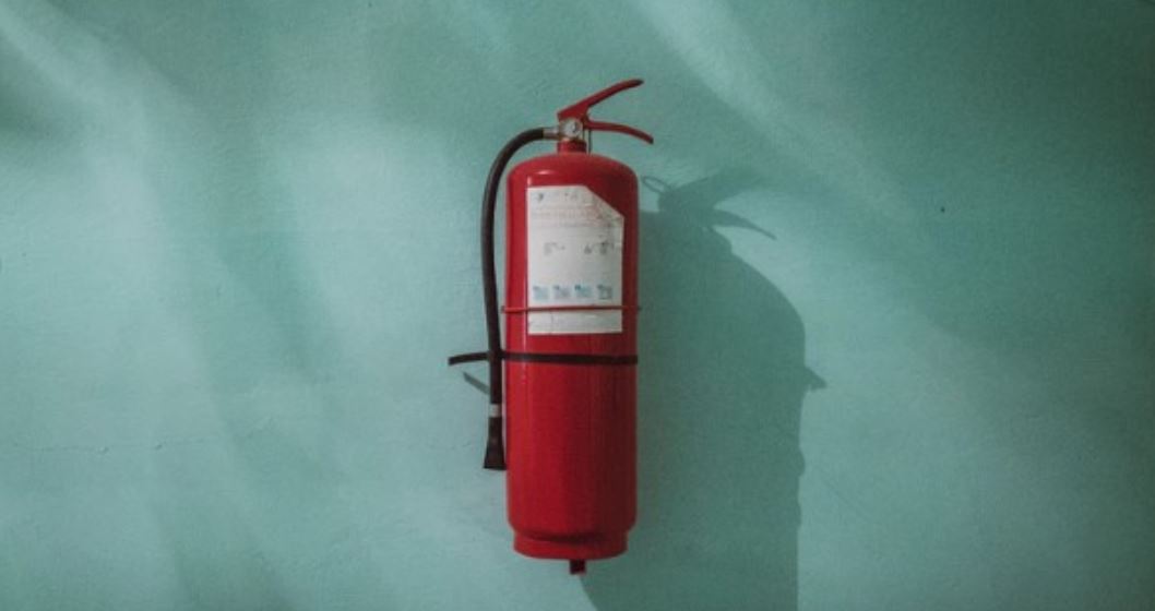 Fire extinguisher Fire extinguisher on the wall